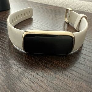 Fitbit Luxe with charger